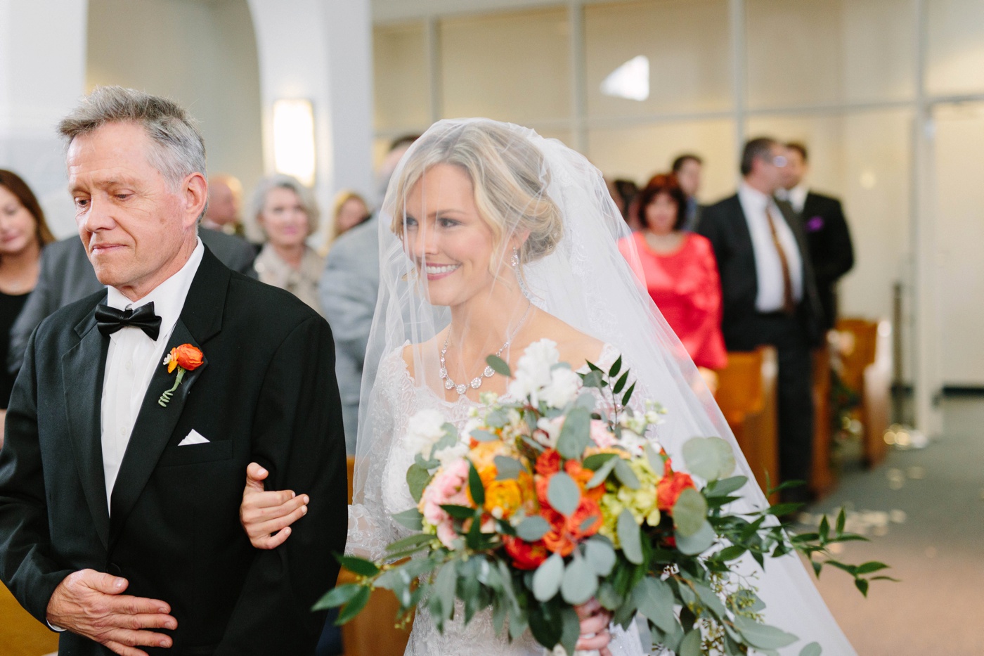 bride walking down aisle photos