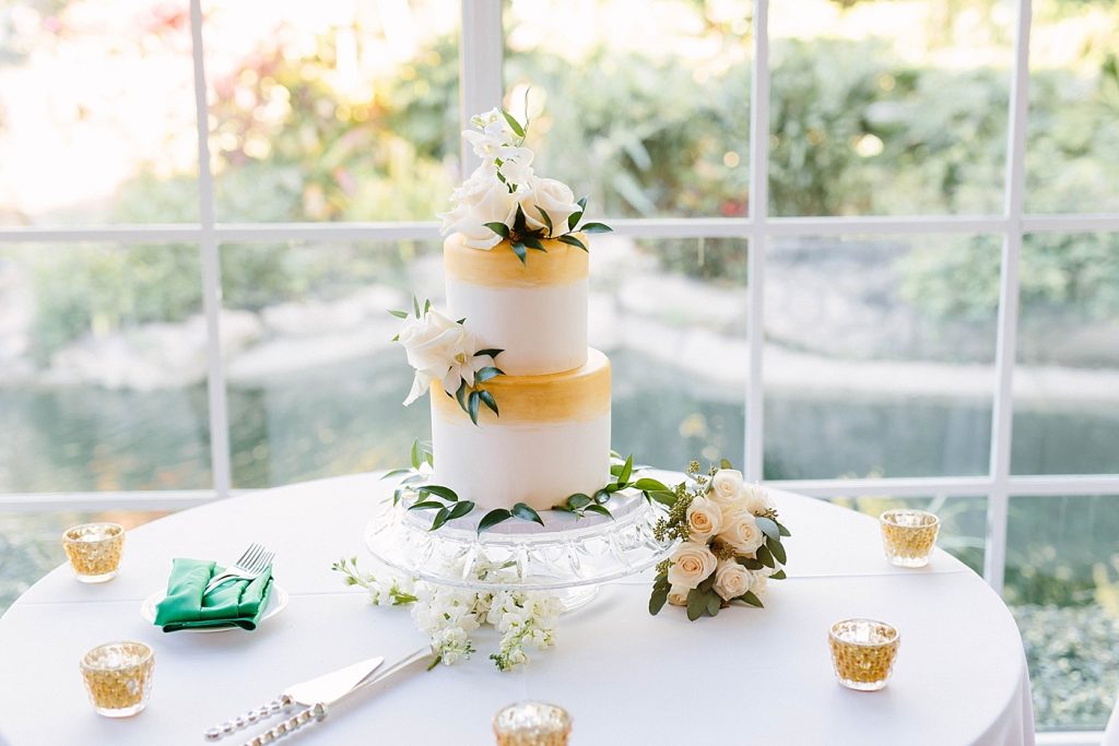 yellow and white wedding cake